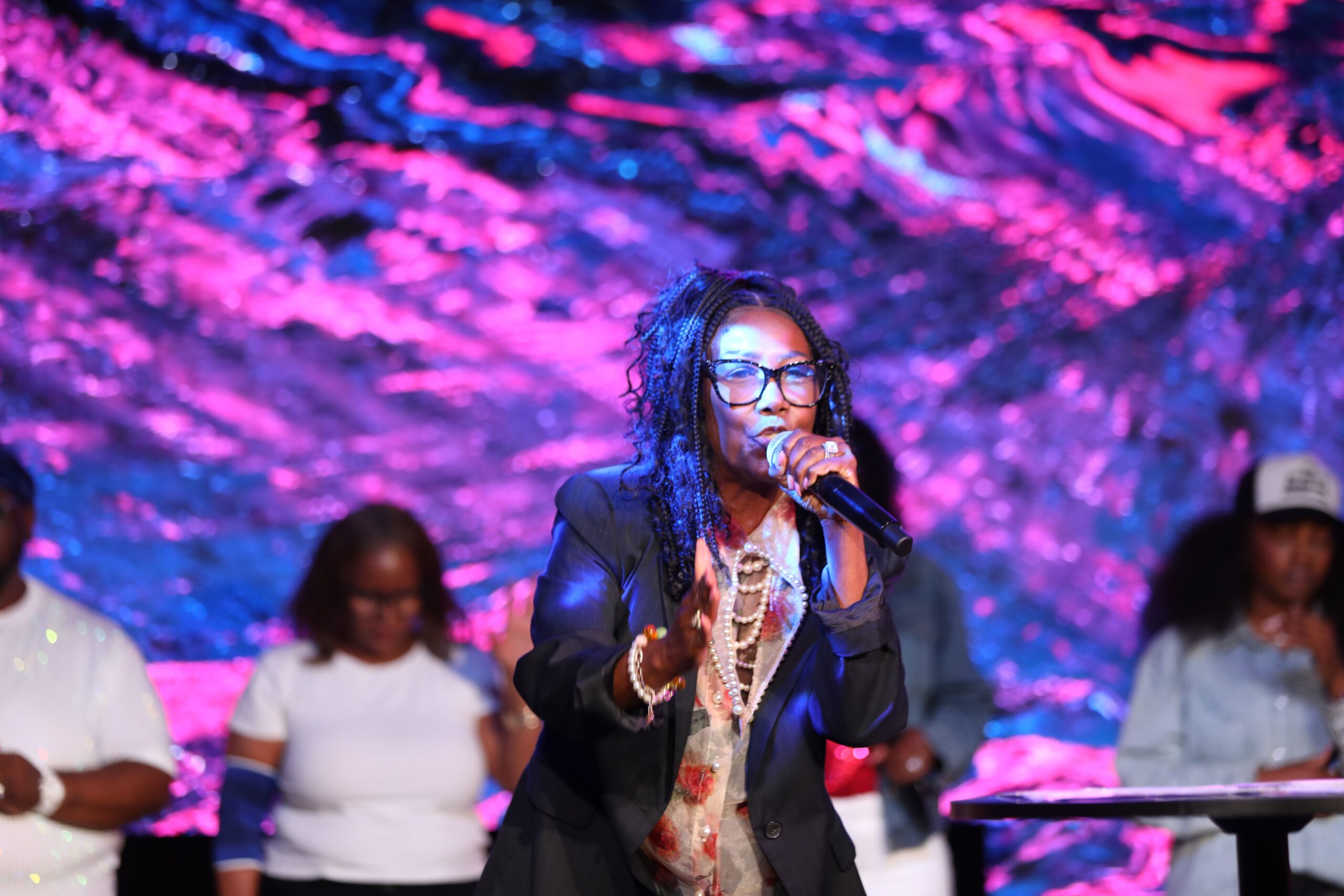 Linda G. Hodge speaking on stage